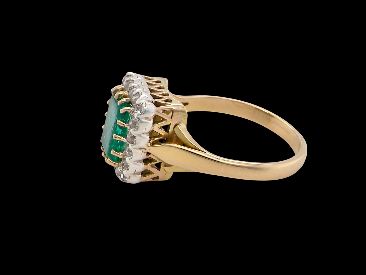 An Emerald and Diamond Cluster Ring, Circa 1950–1960