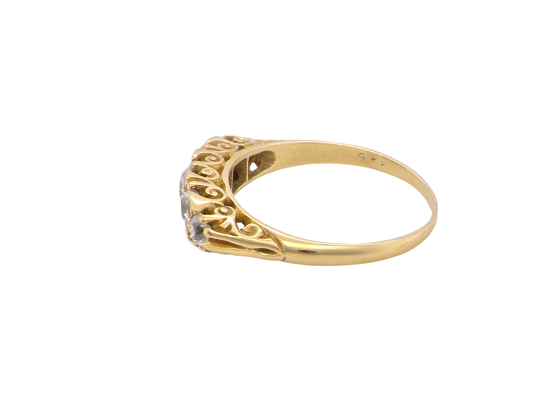 side An antique boat shaped five stone ring. Set with five old cut white diamonds. Centre 5mm (0.45-0.50 carats) each side a 4mm stone, at each end a 2.4mm stone. Total diamond content estimated at one carat.