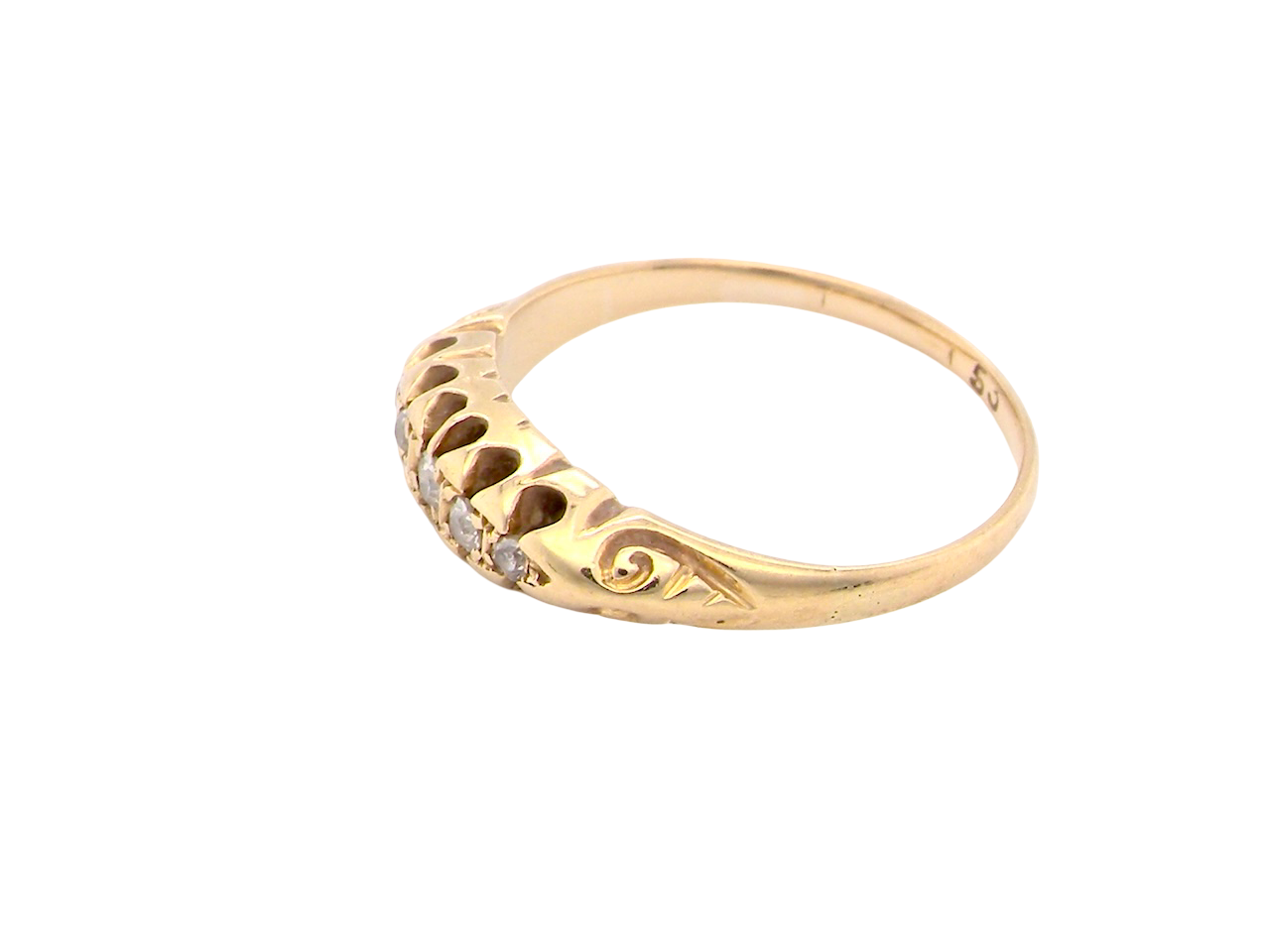 Gold ring with a unique design on a white background