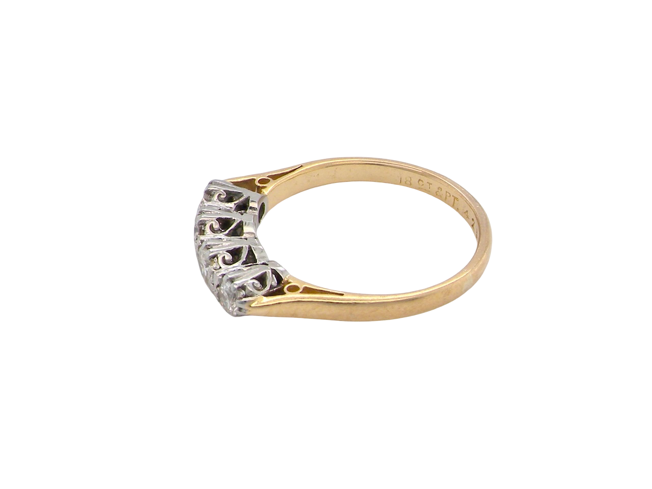 side An early 20th century ring set with diamonds. 