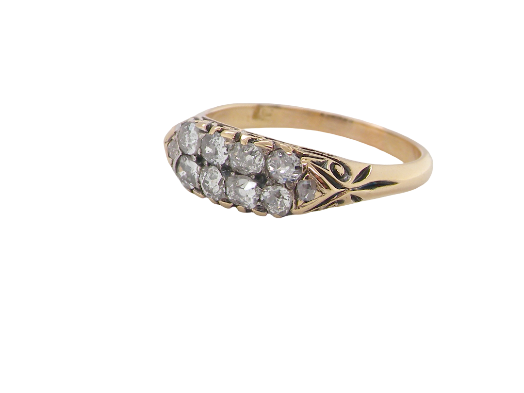 side An eight stone boat shaped diamond ring, with two extra 'accent' diamonds to each end