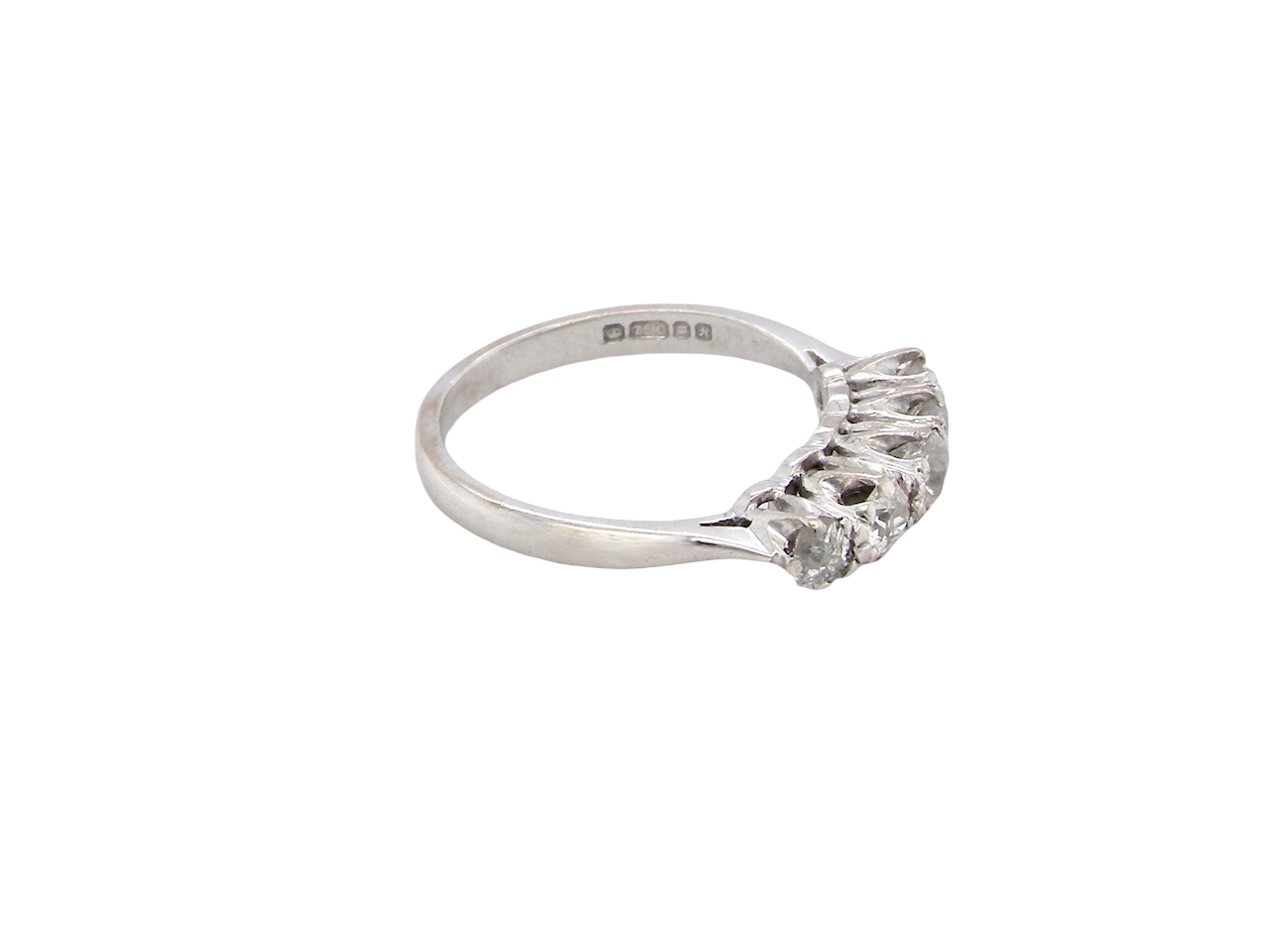 side An elegant 18 carat white gold five-stone ring set with brilliant-cut white diamonds. The centre diamond measures 3.4mm, flanked by two 3.0mm stones and finished with 2.8mm diamonds at each end, creating a beautifully balanced graduated design.