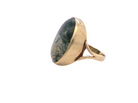 side An impressive dress ring set with a large moss agate semi precious gem stone.