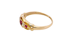 side Set with three bright rubies, centre 3x2.6mm, each end a 2mm ruby. Each side of the centre stone an old brilliant cut white diamond 2.8mm (est 0.08 carats) . Head measures 17x7mm, weight 3.4grams.&nbsp;