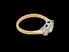 side The iconic trilogy ring. This example set with three fine brilliant cut white diamonds