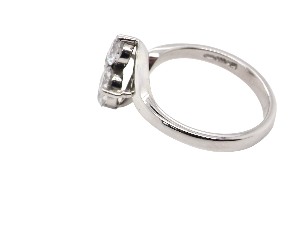 side This four stone ring features brilliant cut white diamonds, each 4mm (0.25 carats). The total estimated weight is one carat, with a colour rating of G-H and a clarity rating of SI.