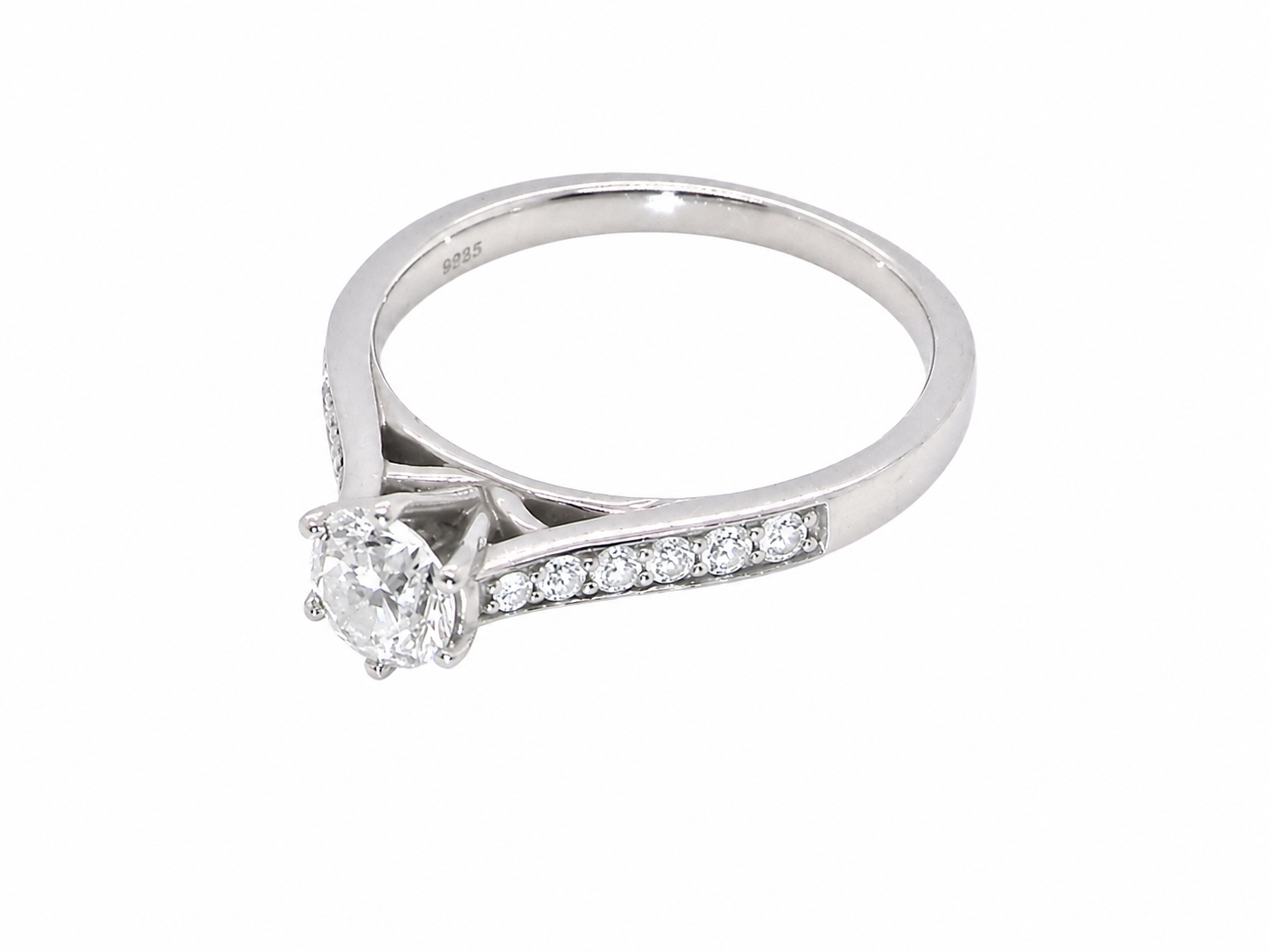 side  beautiful platinum solitaire ring featuring a brilliant-cut white diamond, claw set, measuring 4.8mm and weighing approximately 0.65ct. Diamond graded I colour, SI1 clarity, with an 88-facet cut.