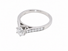 side  beautiful platinum solitaire ring featuring a brilliant-cut white diamond, claw set, measuring 4.8mm and weighing approximately 0.65ct. Diamond graded I colour, SI1 clarity, with an 88-facet cut.
