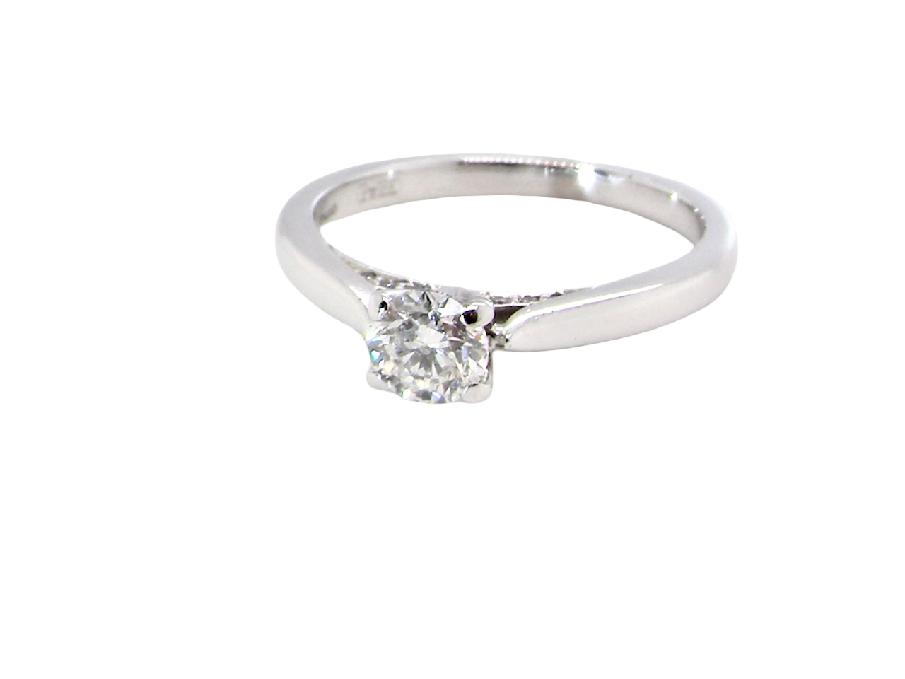 side  beautifully crafted solitaire ring featuring a brilliant-cut white diamond 