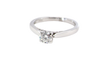 side  beautifully crafted solitaire ring featuring a brilliant-cut white diamond 