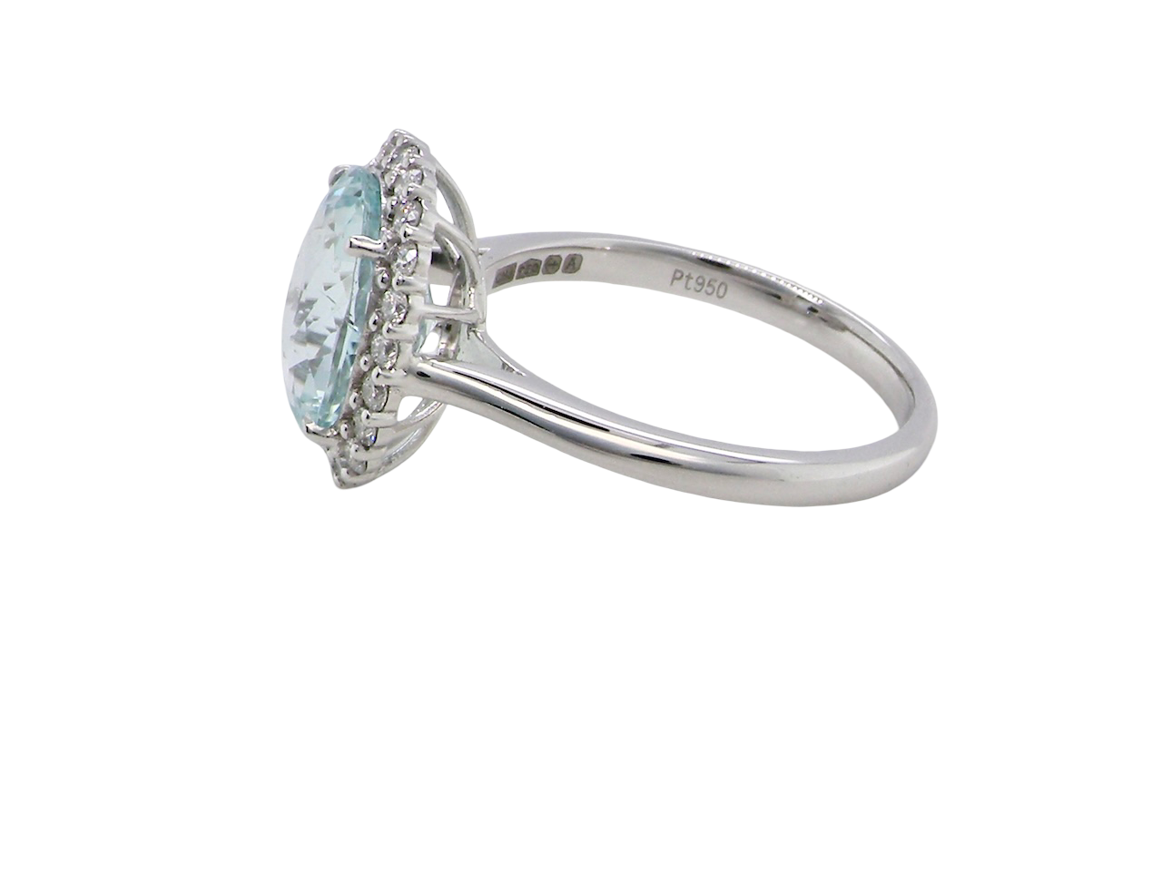 side  elegant cluster ring centred on a beautiful oval aquamarine, 