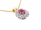 side elegant pendant showcasing a vivid oval-cut raspberry-red ruby