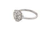 side elegant vintage cluster ring in platinum* and set with a diamond centre stone,&nbsp;0.25ct