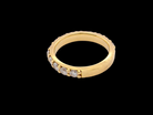 side eternity ring is crafted in 18ct gold and set with fourteen round brilliant-cut white diamonds.