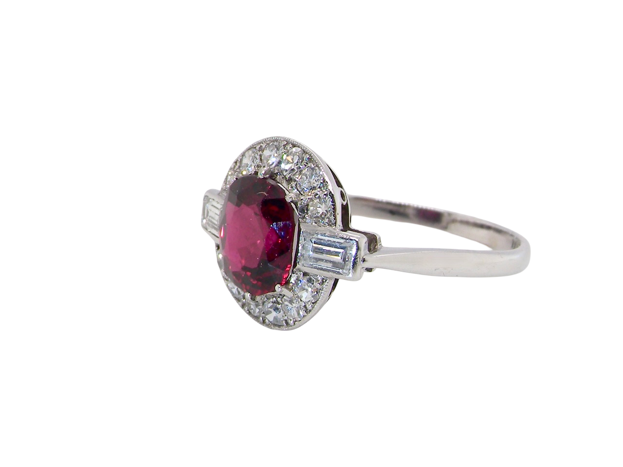 side  fine Art Deco style cluster ring featuring an untreated natural ruby 