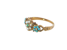 side pretty Victorian dress ring. A daisy cluster design with an emerald centre stone, measures 1.8mm, surrounded by six tiny seed pearls, each 1.8mm

