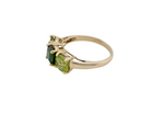 side  striking vintage dress ring showcases a cushion-cut spinel 
