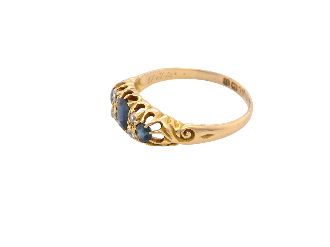 side view An 18 carat gold early 20th century ring set with three sapphires. Centre 5x3.8mm each&nbsp; end 3.8x2.8mm.