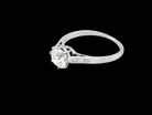 side A timeless vintage solitaire ring set with a striking old brilliant cut white diamond. The central diamond measures approximately 6mm, estimated at 0.75 carat, with colour graded between G–I and clarity SI.