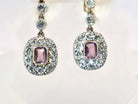 silver  pair of drop earrings from. the glamour era of the Edwardian era. 