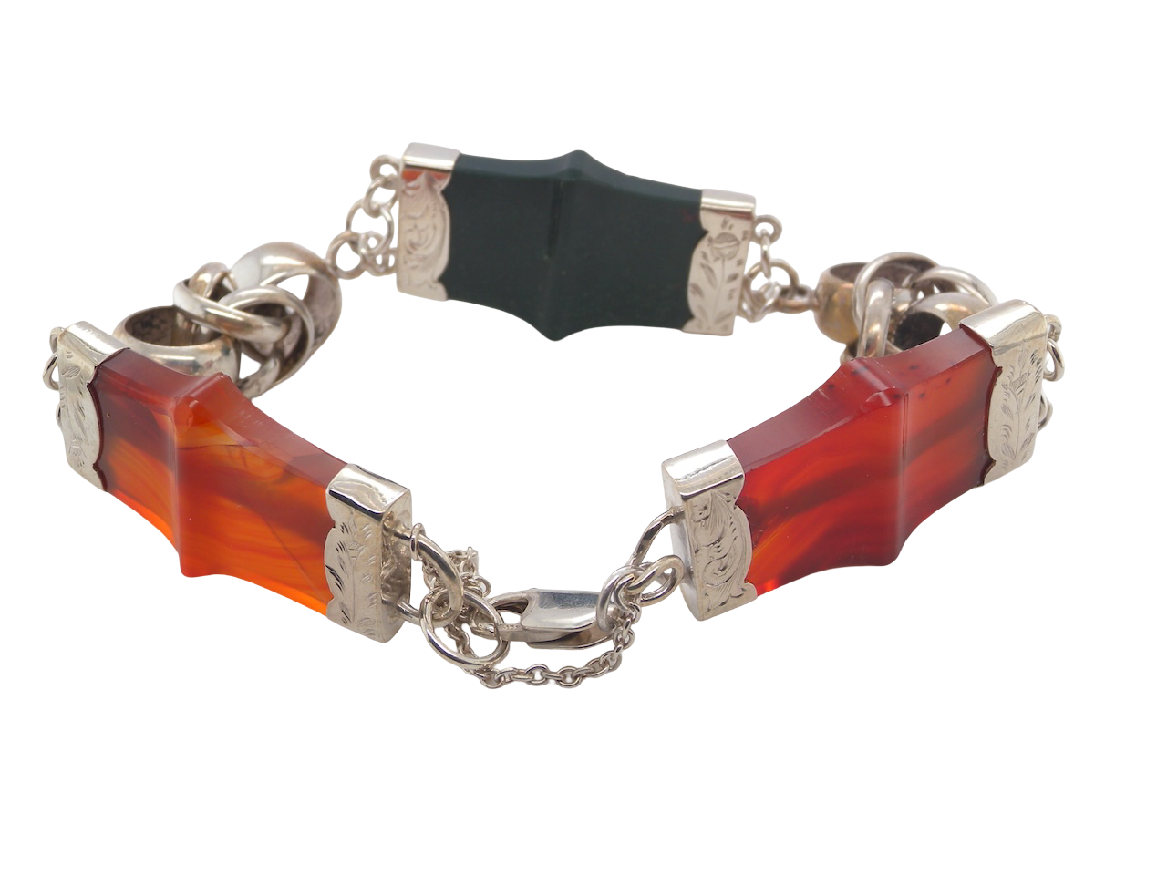 sterling silver bracelet of Scottish origin, featuring a panel of bold, shaped links. Each panel link measures 35 × 20 mm.