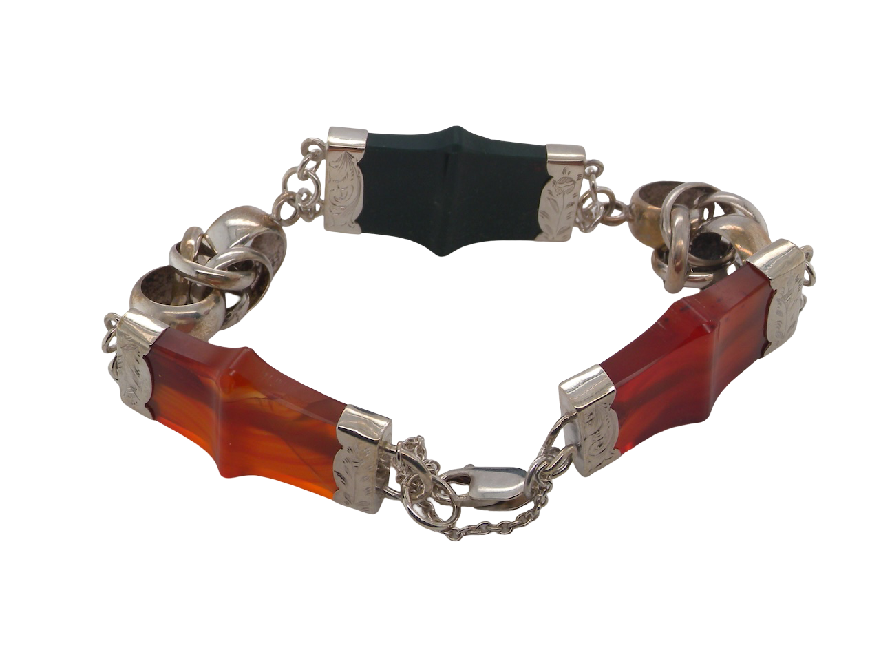 sterling silver bracelet of Scottish origin, featuring a panel of bold, shaped links. Each panel link measures approximately 35 × 20 mm.