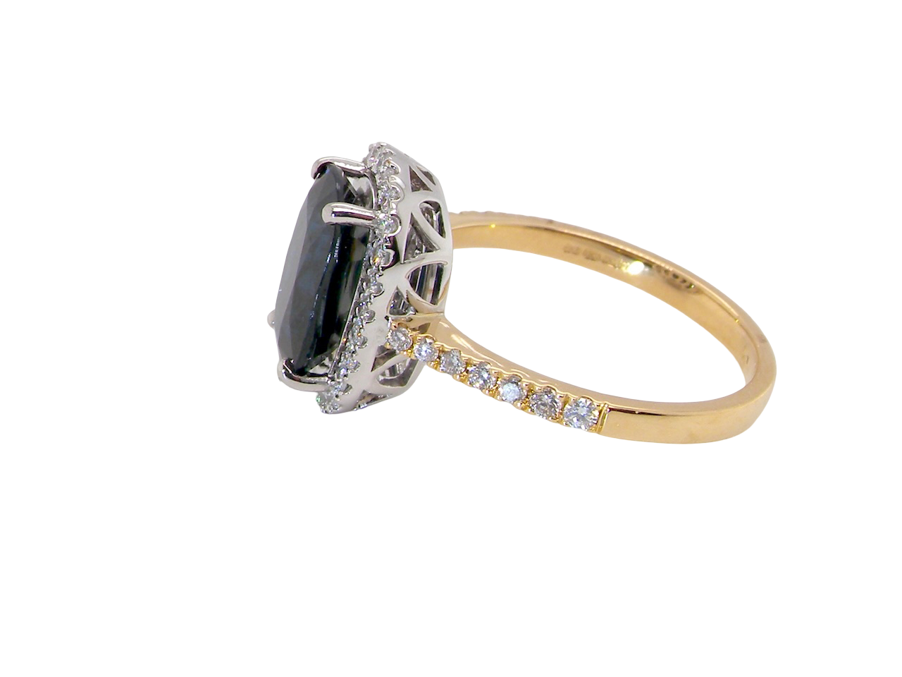striking cluster ring featuring a captivating&nbsp;ink-black blue sapphire,A