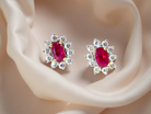 timeless and elegant pair of ruby and diamond cluster earrings.