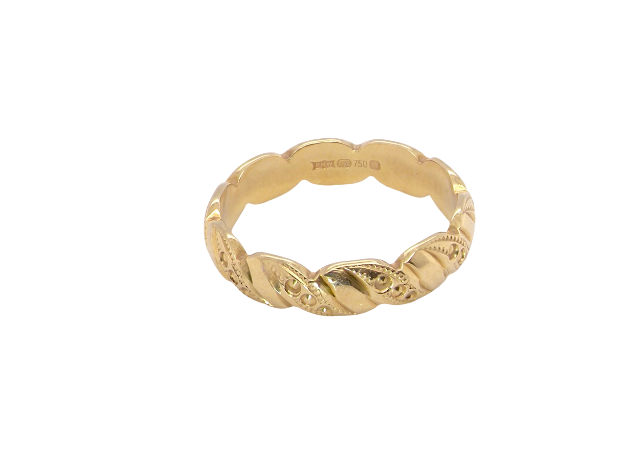 top A lovely wedding ring, scalloped edges with dotted patterns around the body of the ring.