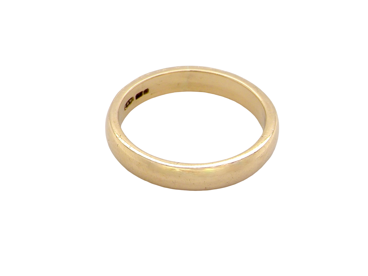 A narrow 18 carat gold wedding ring