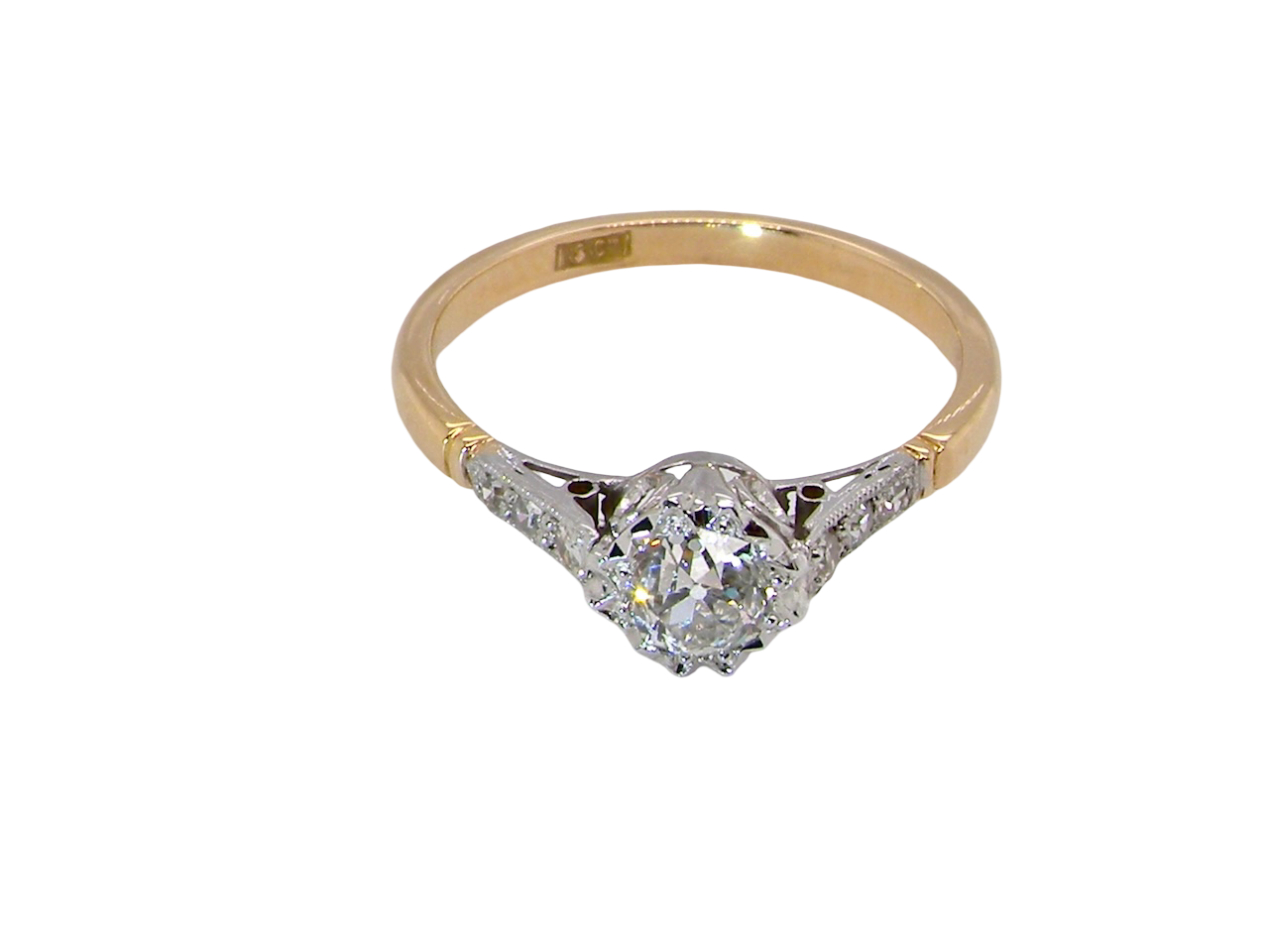 top A ring that features an old brilliant-cut white diamond 