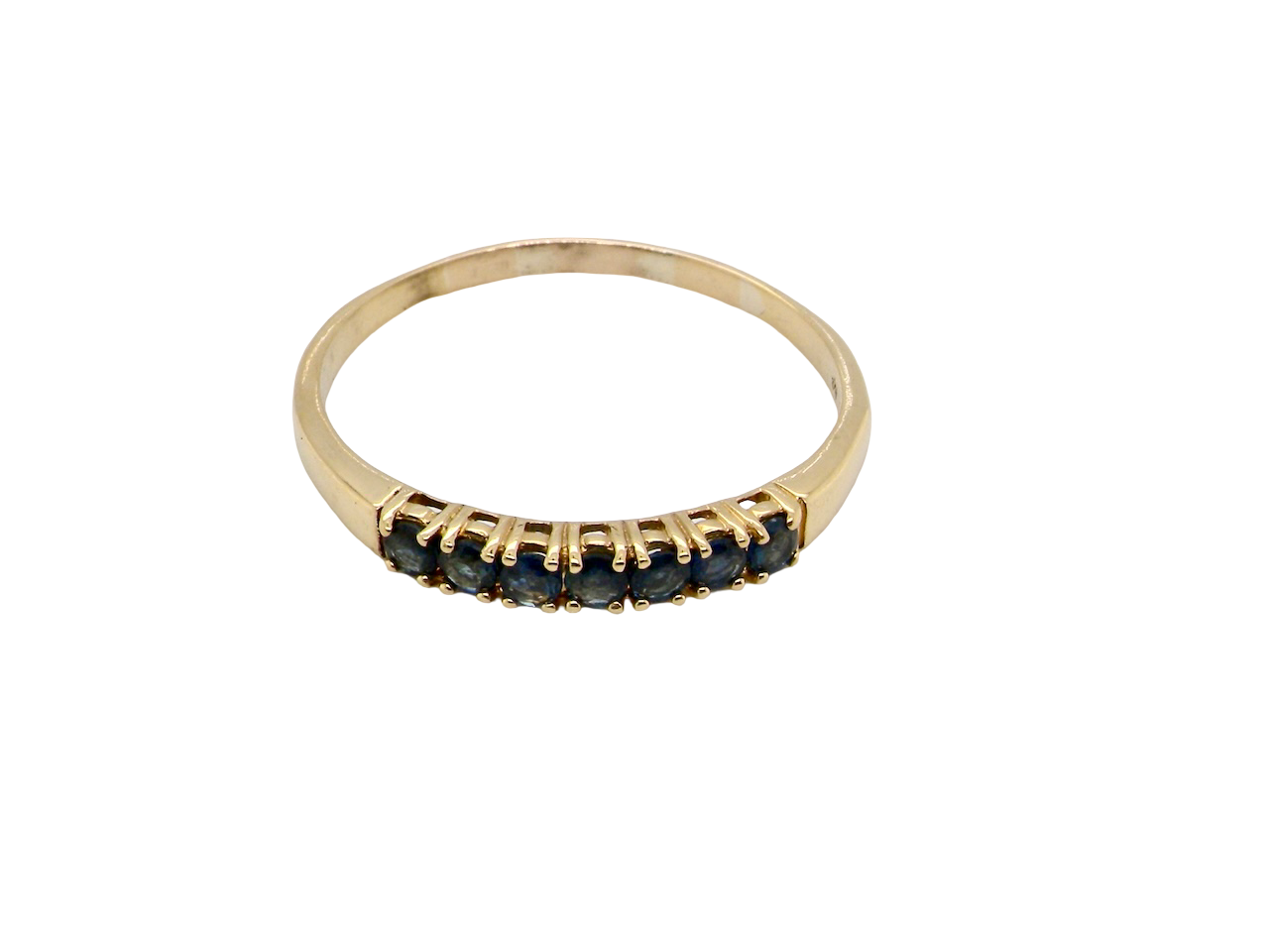 A sapphire half hoop eternity ring 