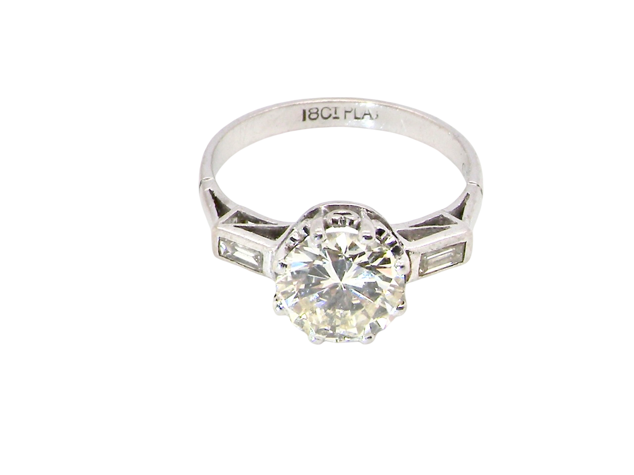 top An Art Deco solitaire ring showcasing a beautiful 1.75 carat diamond