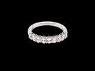 top gorgeous half-hoop eternity ring set with nine oval brilliant-cut white diamonds.