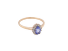top pretty cluster ring that features an oval cut tanzanite gemstone,