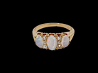 top view A beautiful Victorian dress ring, set with three finely matched oval opals, 