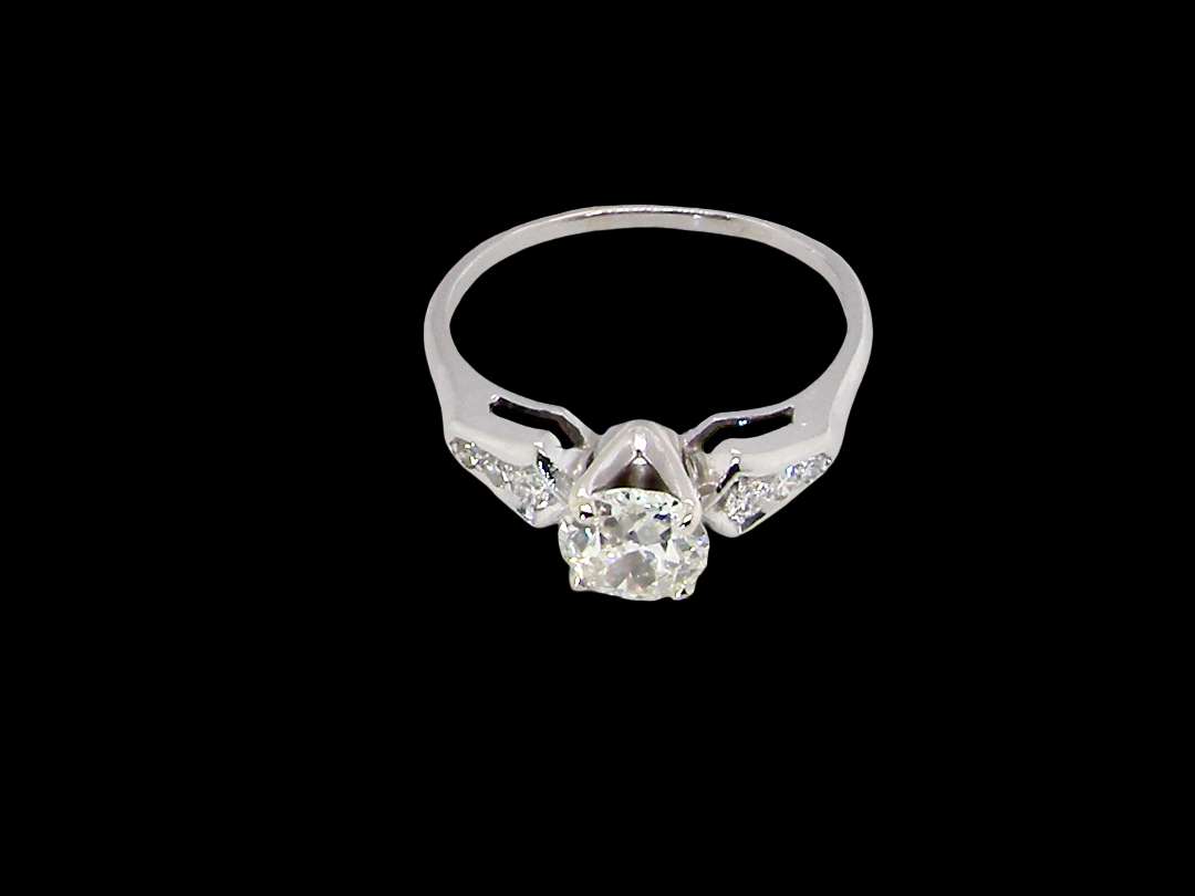top view A fine solitaire ring featuring an e lovely brilliant cut white diamond. Measures 6.3mm (est 0.85 carats) very bright white stone, colour H-i, clarity VS. Head depth 7mm.&nbsp;
