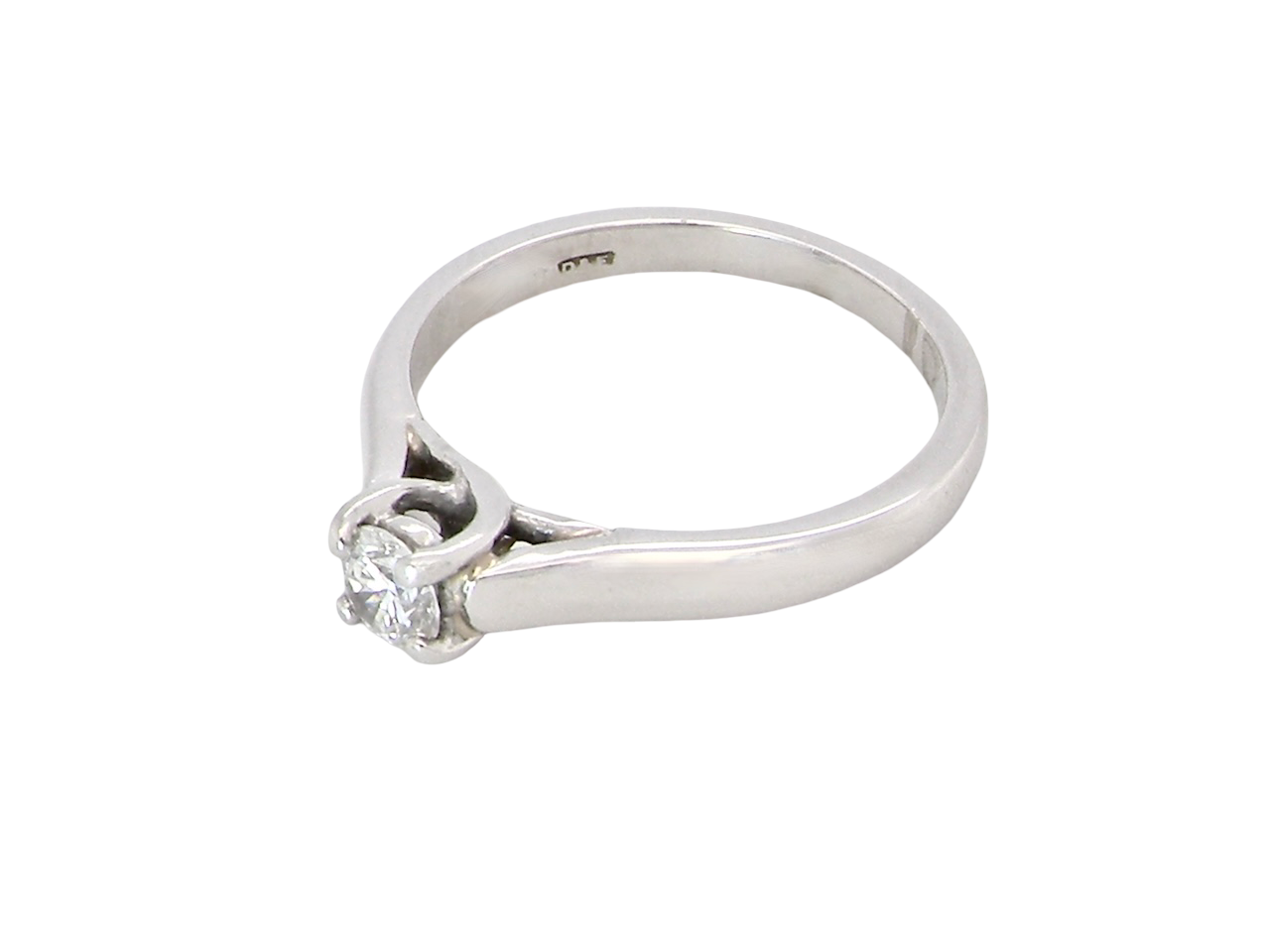 top view A single stone solitaire diamond ring. The modern brilliant cut white diamond measures 3.9mm (0.22 carats est) Colour G-h, clarity VS.
