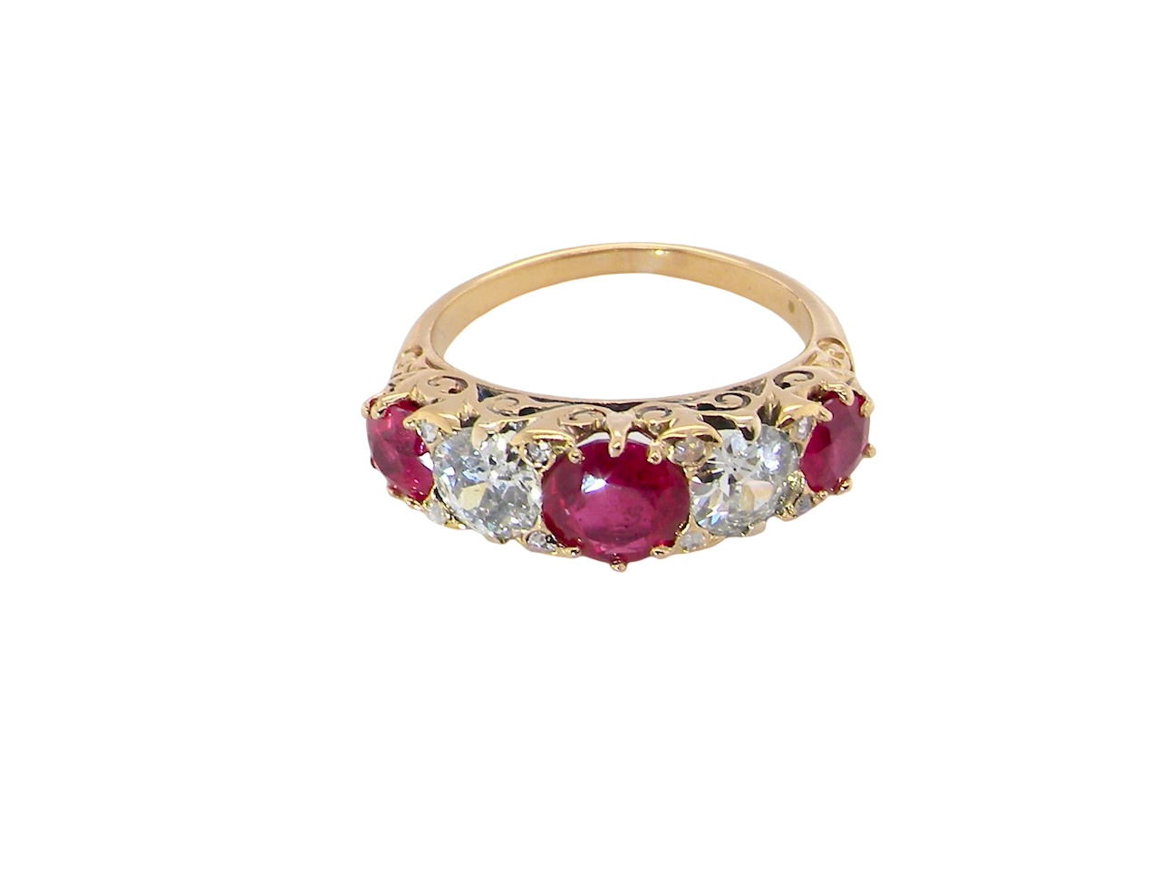top view A superb Victorian ring, carved boat shaped head. Set with three fine rubies , 