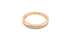 top view An 18 carat yellow gold half hoop eternity ring.

Set with thirty baguette cut white diamonds, 