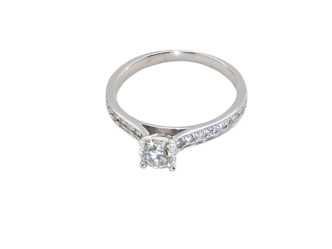 top view An elegant and timeless 18 carat white gold diamond solitaire ring,