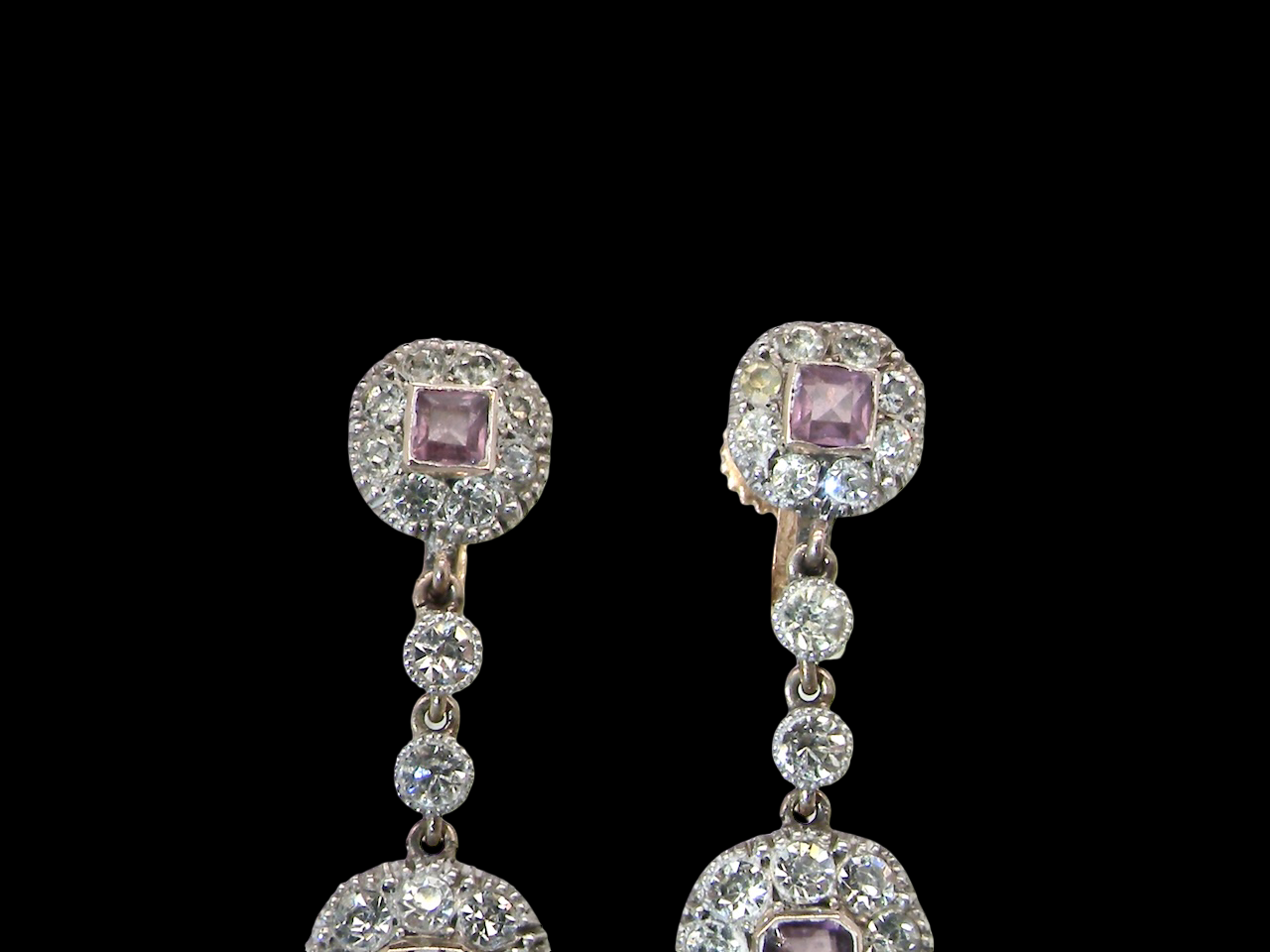  pair of drop earrings from. the glamour era of the Edwardian era. top view