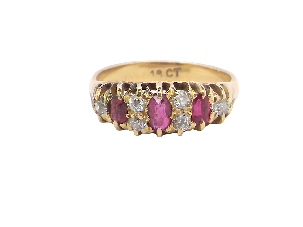 typical boat shaped ring from the late Victorian era, probably 1890-1900. This ring is set with three oval cut rubies,