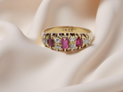 typical boat shaped ring from the late Victorian era, probably 1890-1900. This ring with three oval cut rubies,