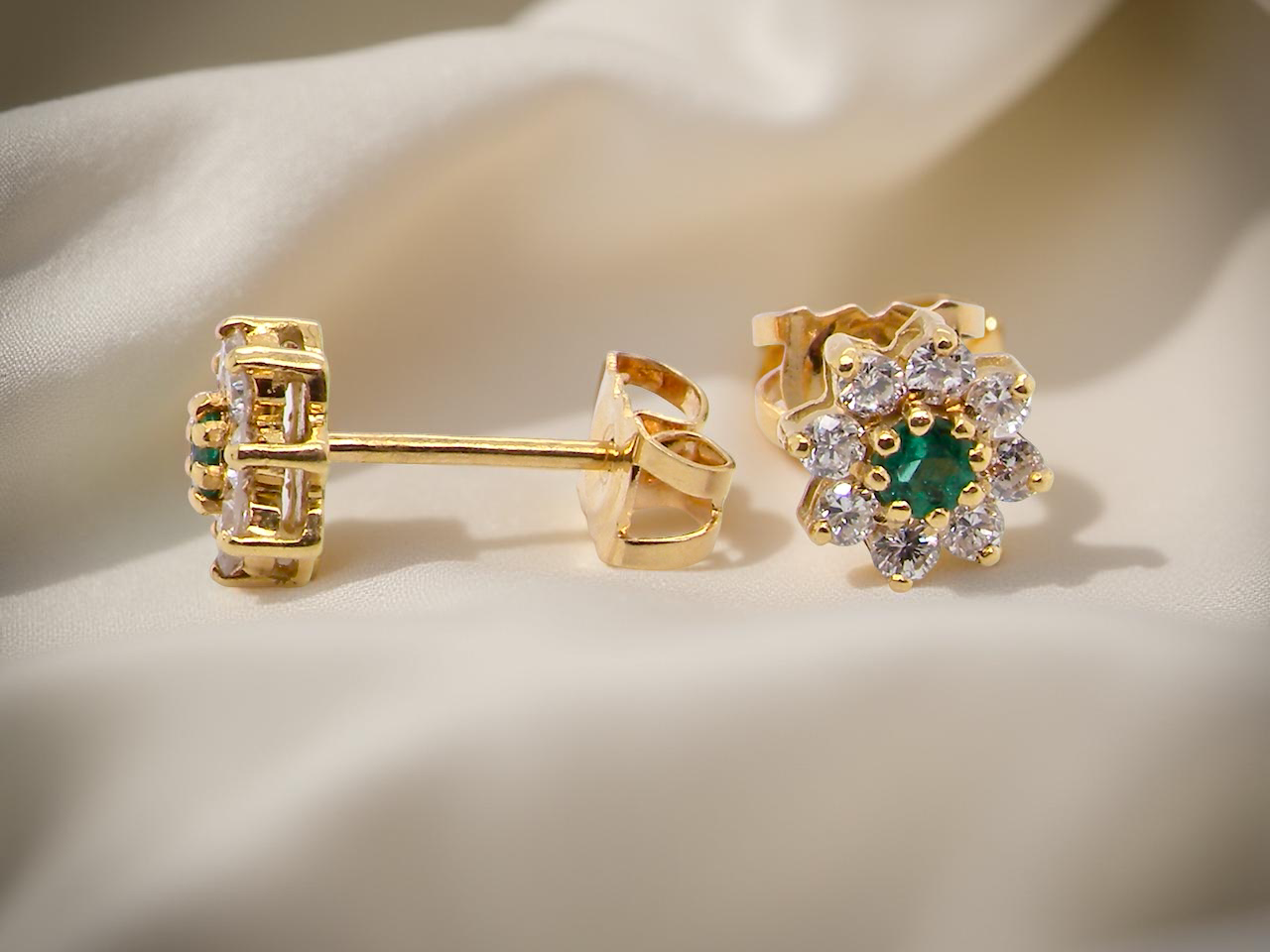 A pretty pair of Emerald and Diamond earrings