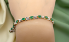 A white gold Emerald and Diamond bracelet