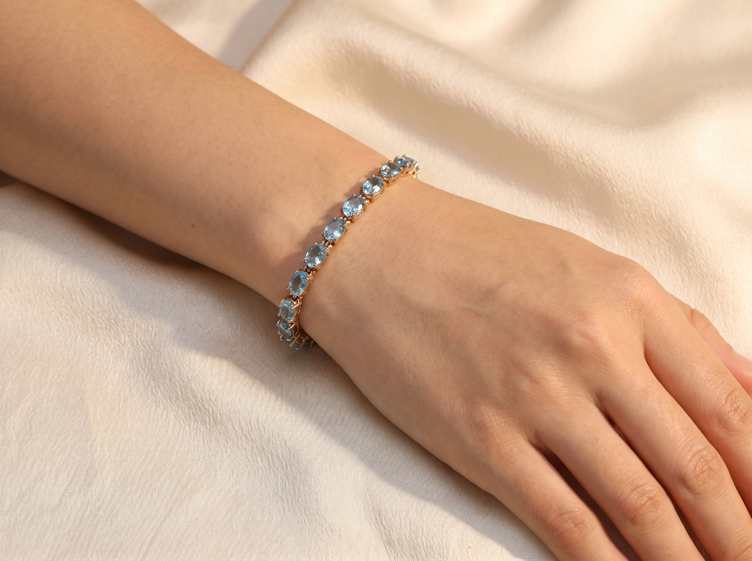 wrist view A blue topaz line bracelet