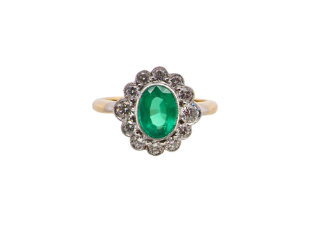 A fabulous Emerald and Diamond cluster ring