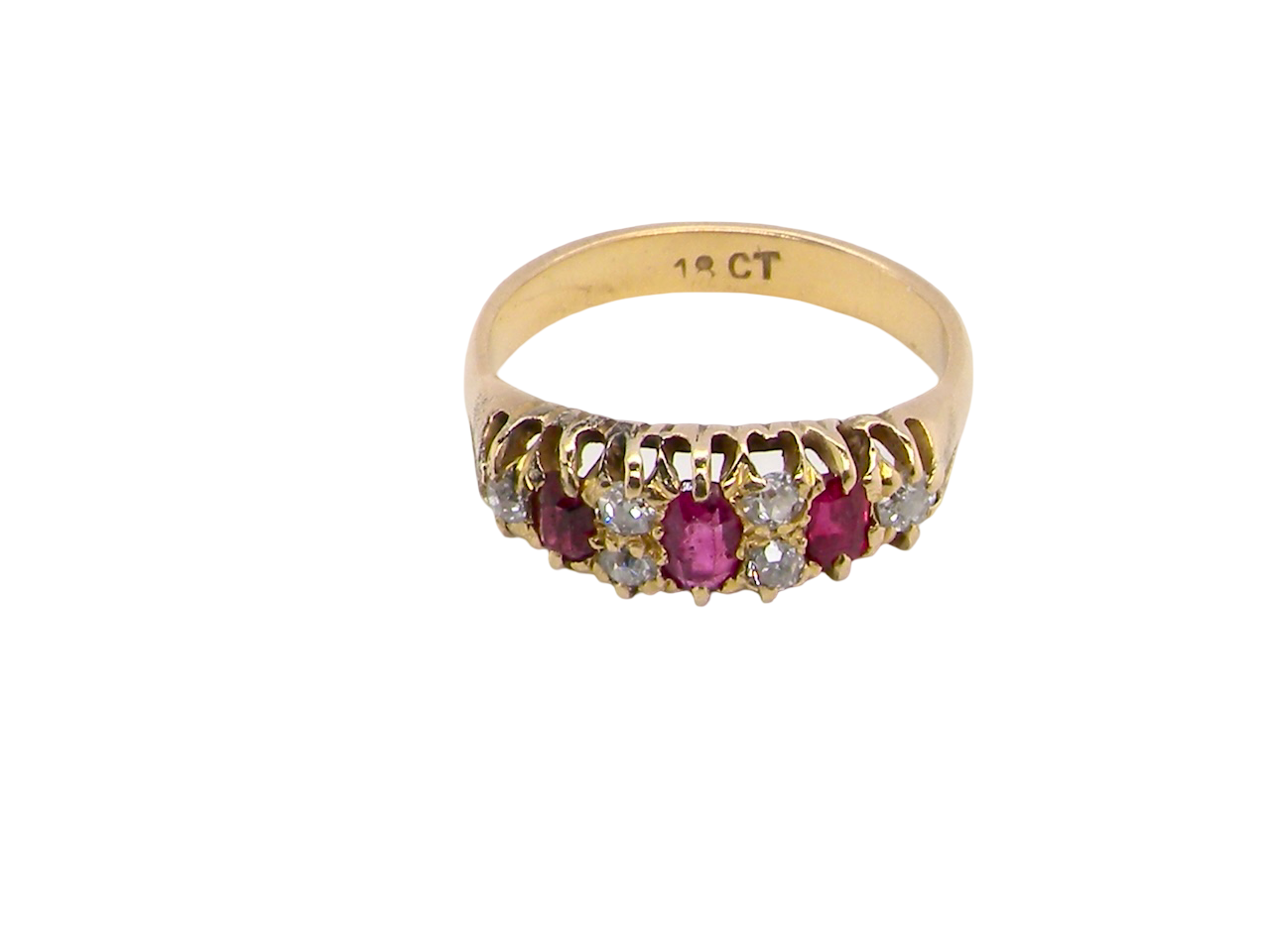 top typical boat shaped ring from the late Victorian era, probably 1890-1900. This ring is set with three oval cut rubies,