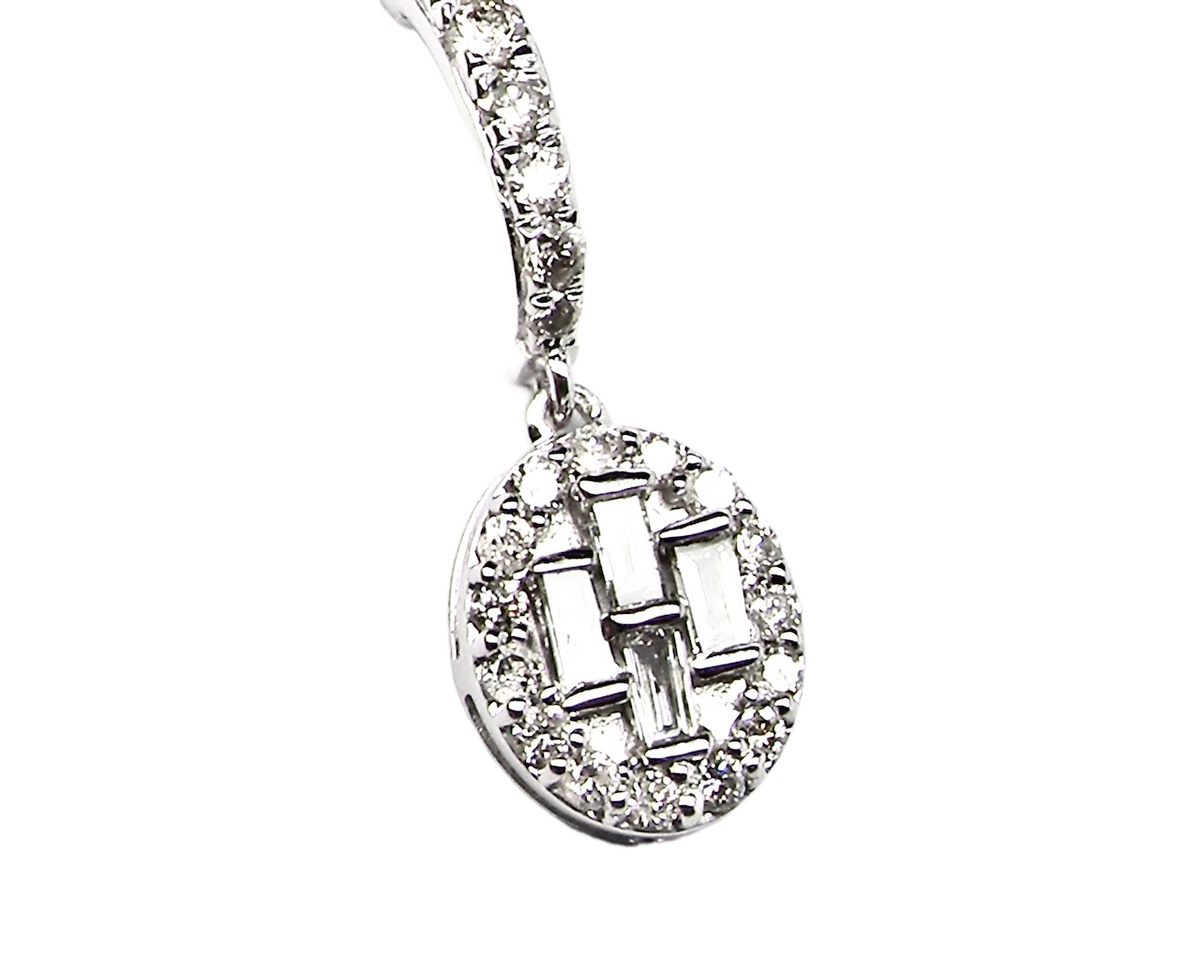 A pair of oval shaped diamond cluster drop earrings-LESS THAN HALF PRI ...